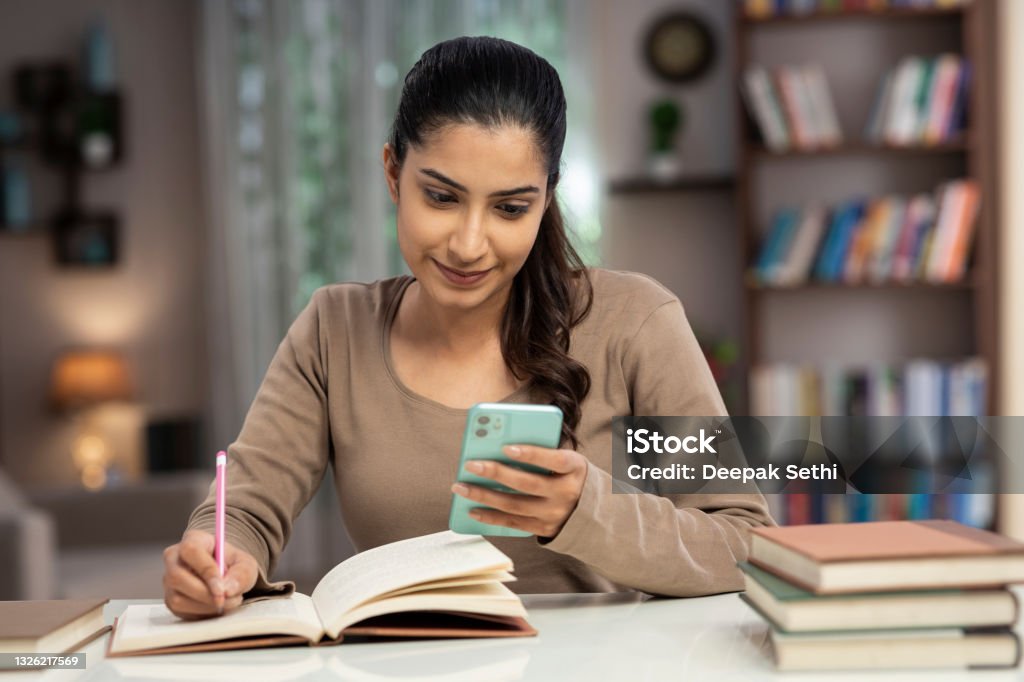 Student in India using ChatGPT on phone for study and productivity