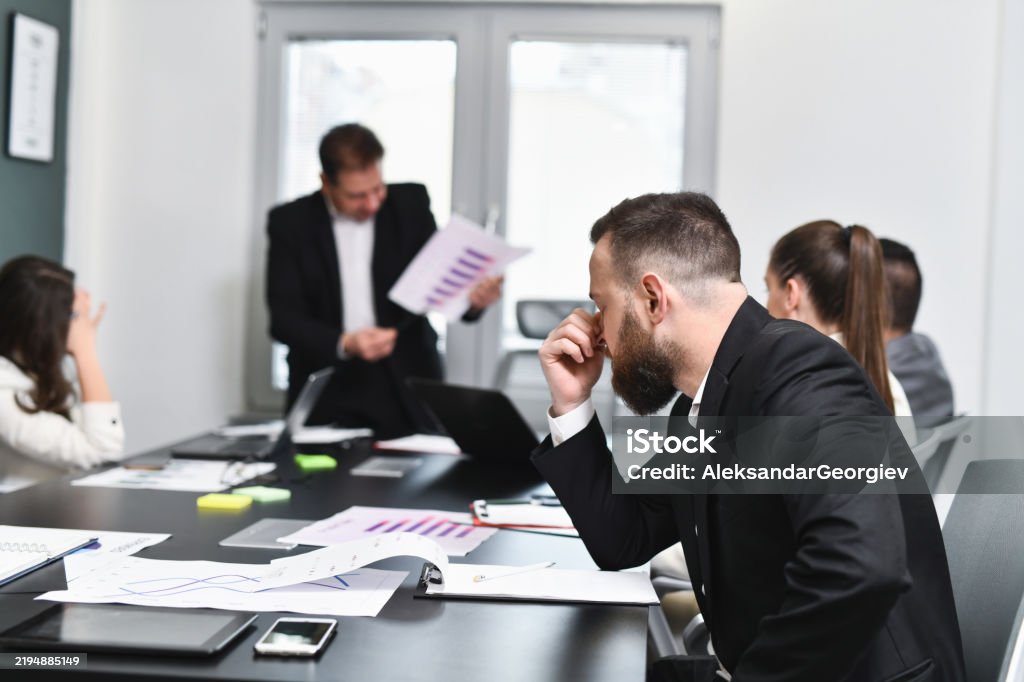 Deel and Rippling logos in a tense corporate setting with a shadowy figure symbolizing spying